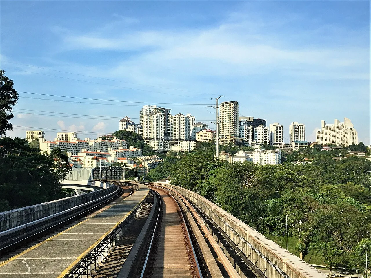 View over the Sprint Highway and MRT tracks toward Bangsar's skyline.