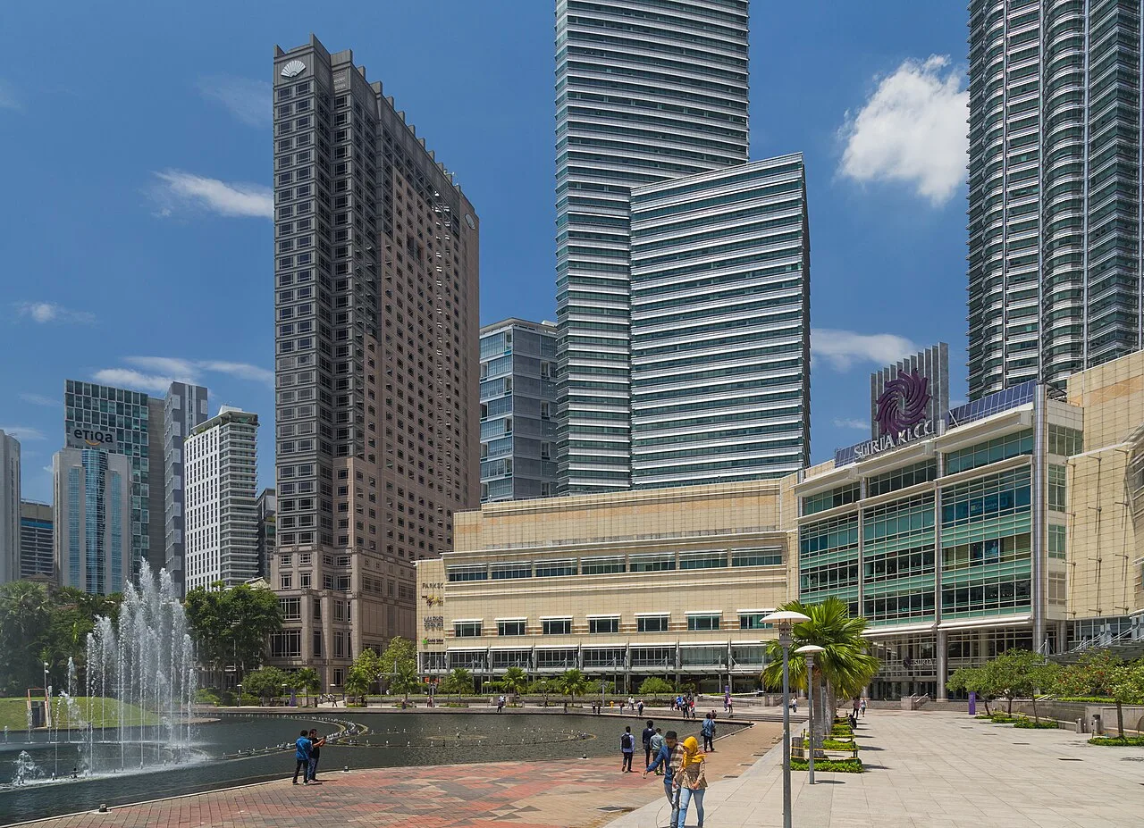 KLCC Park, its fountains and the Suria KLCC complex.