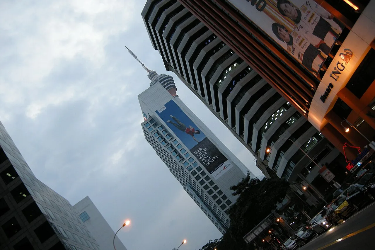 Street-level view among the towers of KLCC.